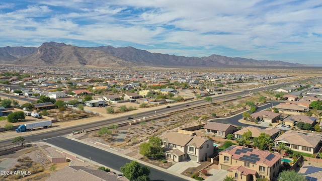 drone / aerial view with a mountain view and a residential view