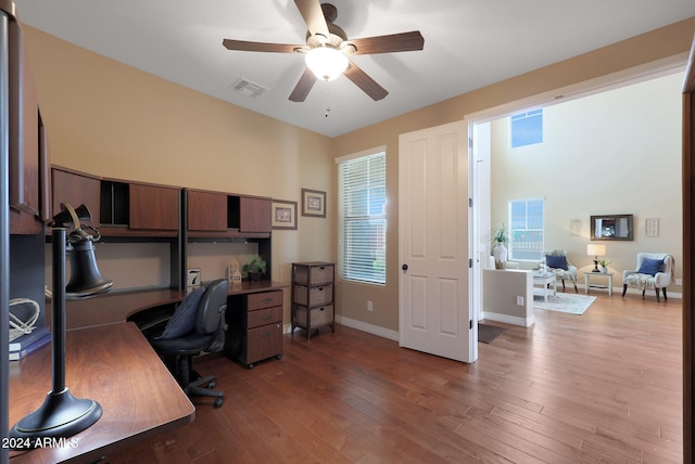 office space featuring hardwood / wood-style flooring and ceiling fan