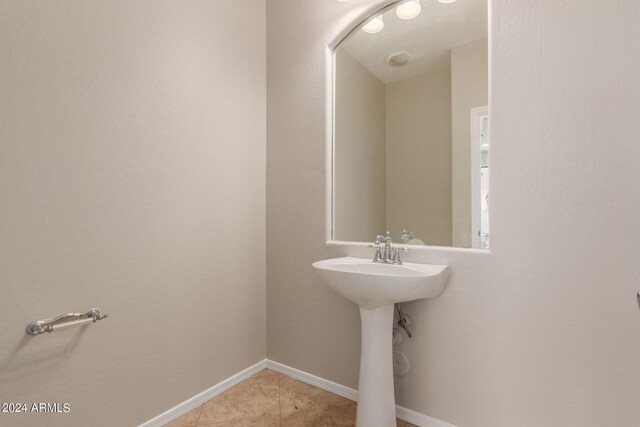 bathroom featuring tile patterned flooring