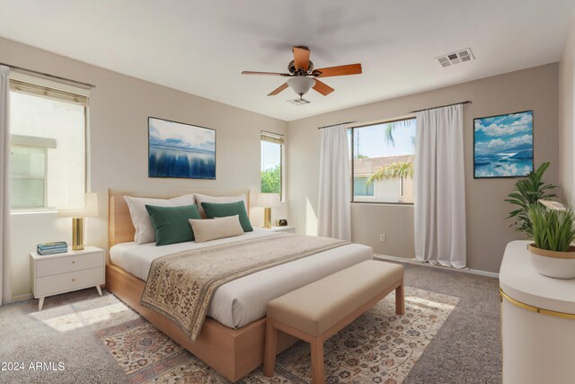 carpeted bedroom with ceiling fan