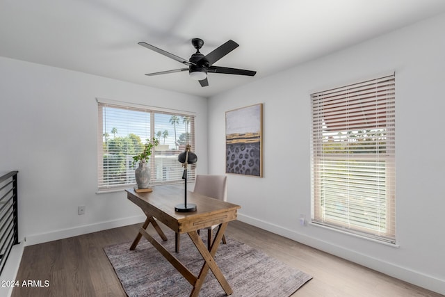 office with ceiling fan and wood-type flooring