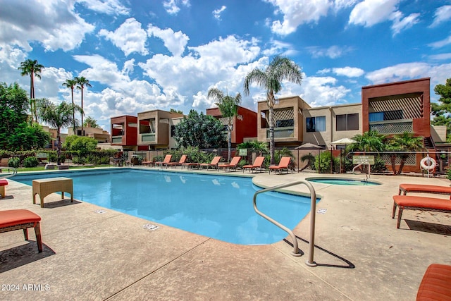 view of pool featuring a patio