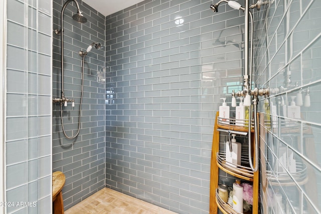 bathroom with tiled shower