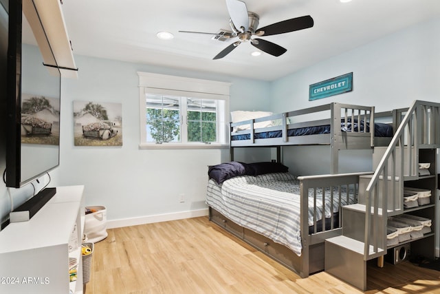 bedroom featuring wood-type flooring and ceiling fan