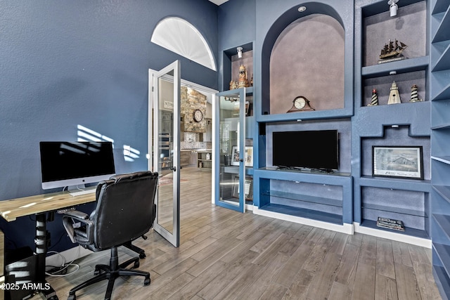 26475 N Wrangler Rd, Scottsdale, AZ 85255 - home office featuring wood finished floors and a textured wall