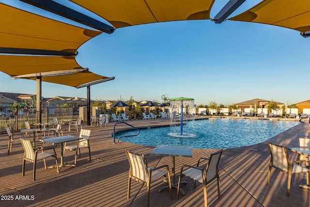 view of swimming pool featuring pool water feature