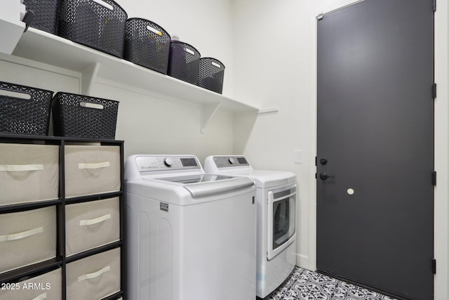 laundry area with washer and dryer