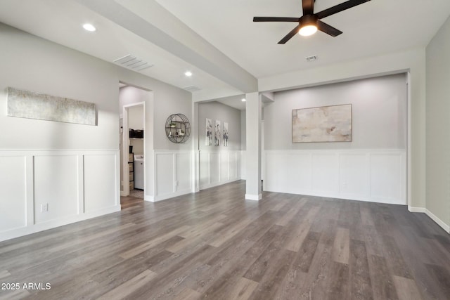 unfurnished living room with ceiling fan and hardwood / wood-style floors