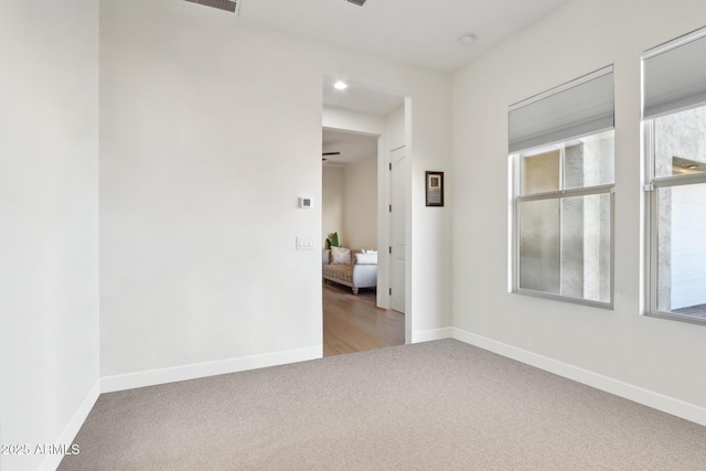 view of carpeted spare room