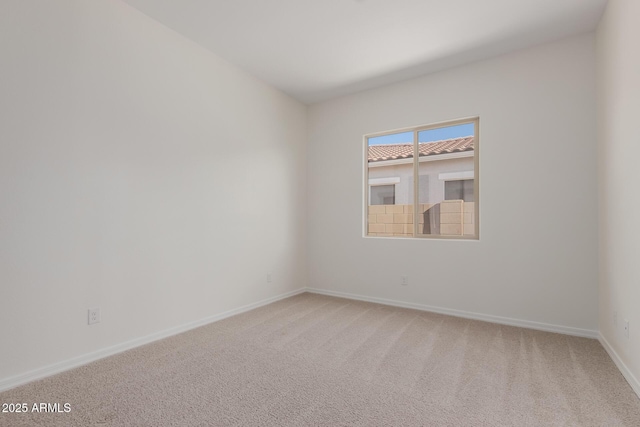 empty room featuring carpet floors