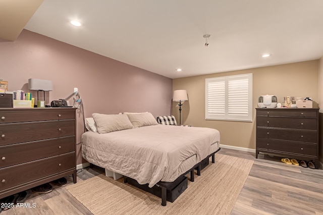 bedroom featuring light wood-type flooring