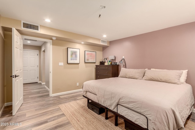 bedroom featuring light hardwood / wood-style flooring