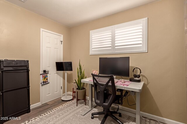 office area with hardwood / wood-style floors