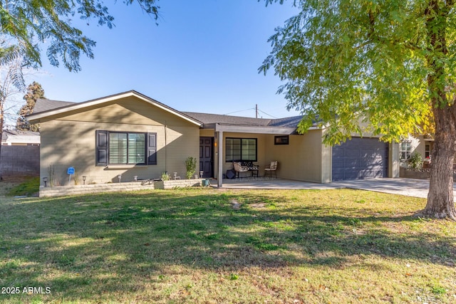 view of front of house with a garage and a front yard