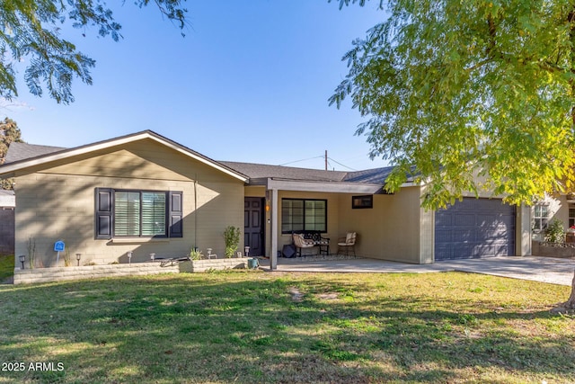 single story home with a front lawn, a garage, and a patio area