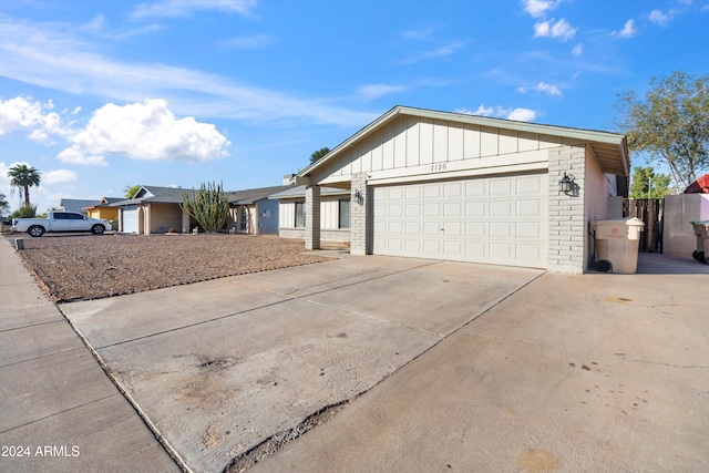 ranch-style home with a garage