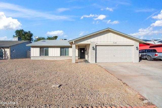 single story home with a garage