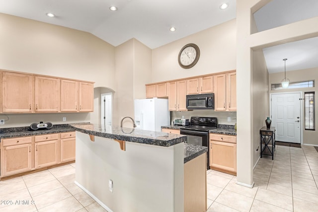 kitchen with light tile patterned floors, high vaulted ceiling, black appliances, and light brown cabinets