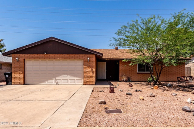 4420 E Covina St, Mesa, AZ 85205 - single story home featuring brick siding, concrete driveway, an attached garage, and roof with shingles