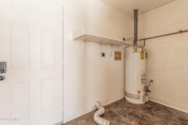 utility room featuring water heater