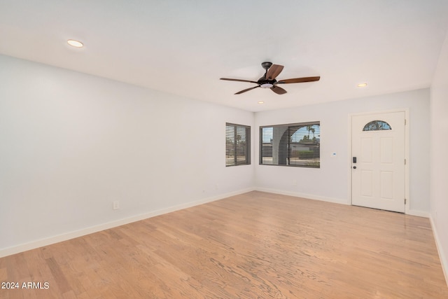 interior space featuring ceiling fan and light wood-type flooring