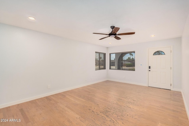 interior space with light wood-style floors, recessed lighting, baseboards, and a ceiling fan