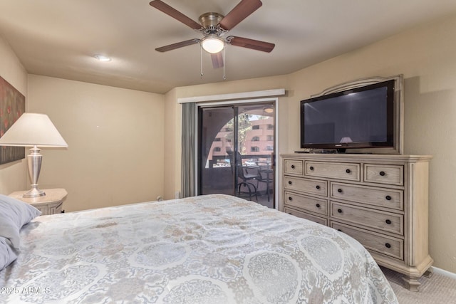 carpeted bedroom featuring baseboards, a ceiling fan, and access to exterior