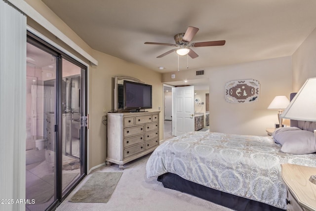 carpeted bedroom with connected bathroom, visible vents, and access to exterior