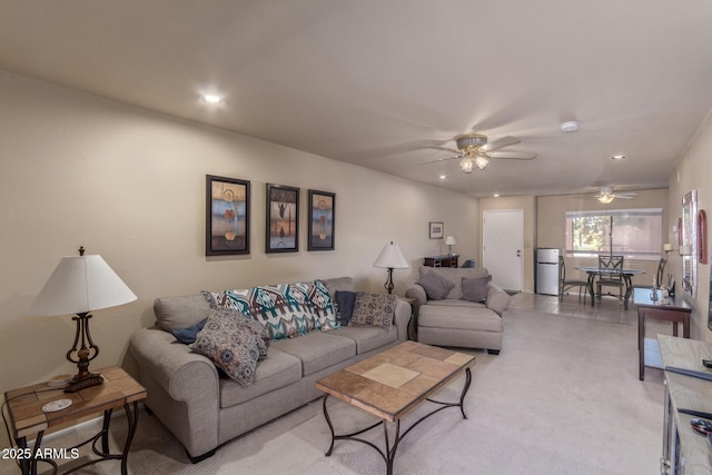 living room with a ceiling fan and recessed lighting