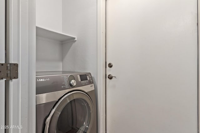 laundry area with washer / dryer