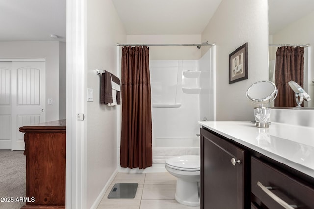 full bathroom featuring tile patterned flooring, shower / bath combination with curtain, vanity, and toilet