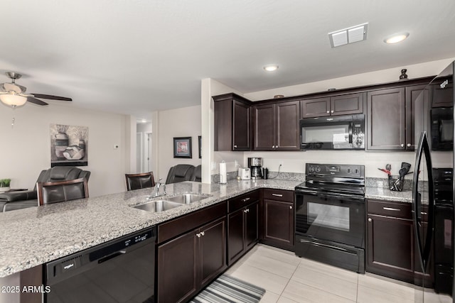 kitchen with kitchen peninsula, dark brown cabinetry, sink, black appliances, and light tile patterned floors