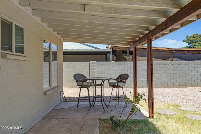view of patio with fence