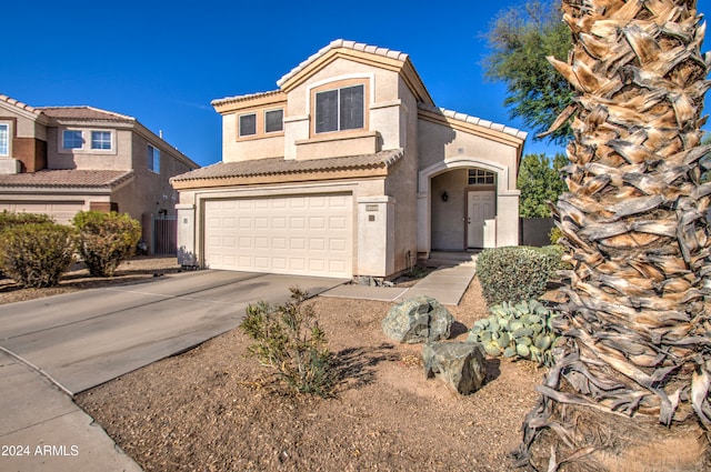 view of front of property featuring a garage