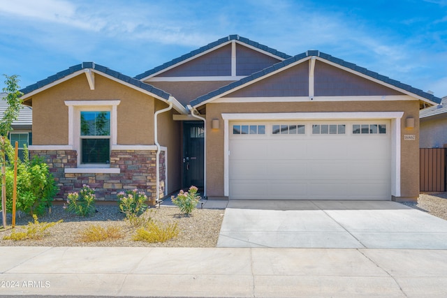 craftsman-style house featuring a garage