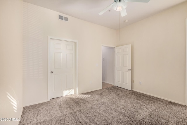 unfurnished bedroom with carpet flooring and ceiling fan