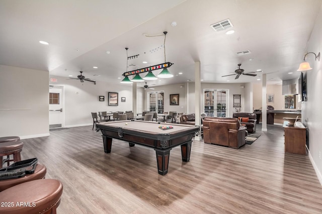 game room with hardwood / wood-style floors, ceiling fan, and billiards