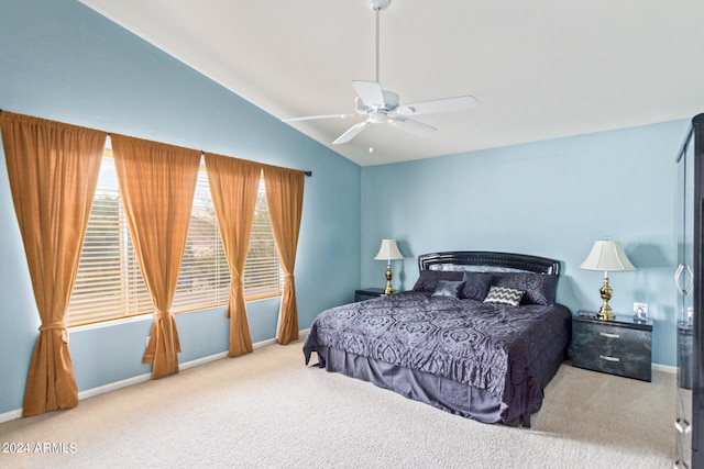 bedroom featuring carpet flooring, ceiling fan, and vaulted ceiling