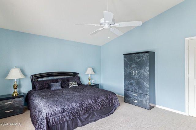 bedroom with vaulted ceiling, ceiling fan, and carpet