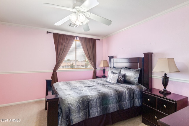 bedroom with crown molding, light colored carpet, and ceiling fan