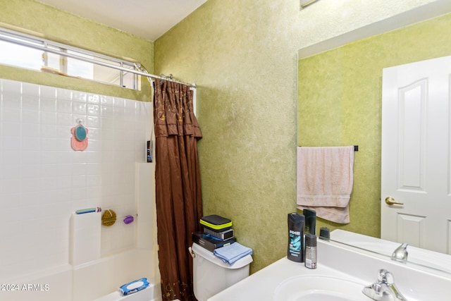 full bathroom with vanity, toilet, and shower / bath combination with curtain