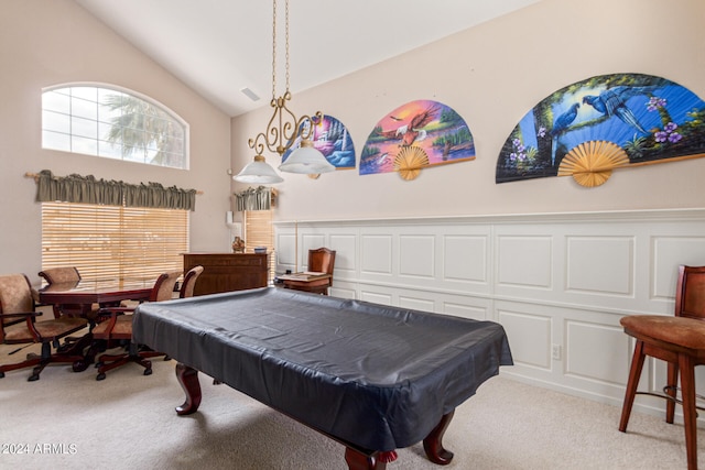 playroom featuring high vaulted ceiling, pool table, and light colored carpet