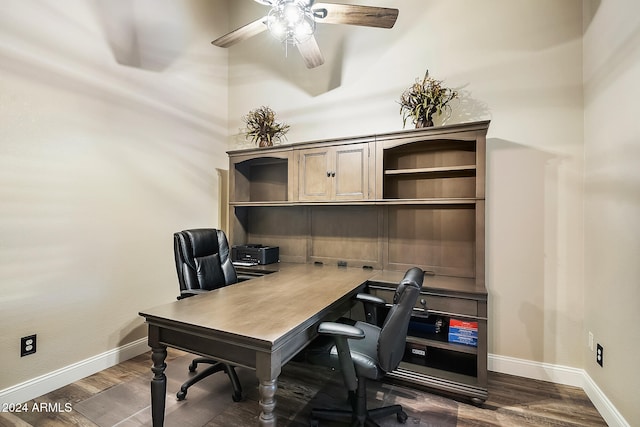 office space featuring dark hardwood / wood-style flooring and ceiling fan