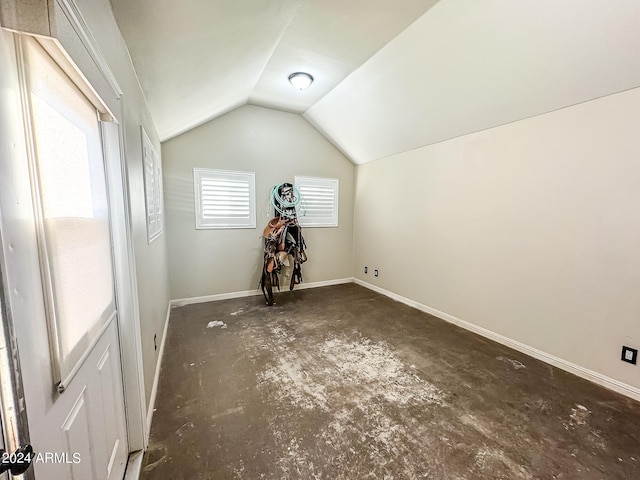 bonus room featuring vaulted ceiling