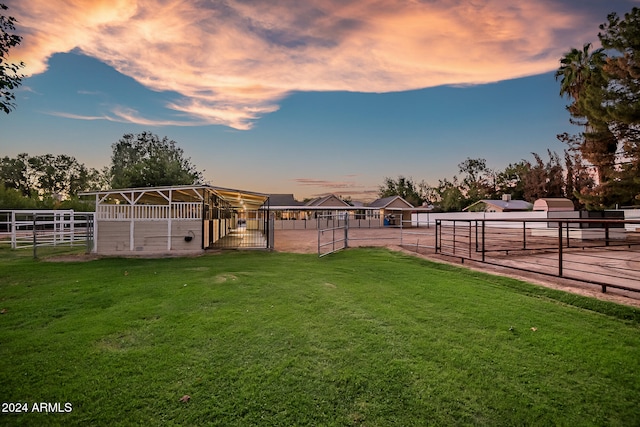 yard at dusk with an outdoor structure