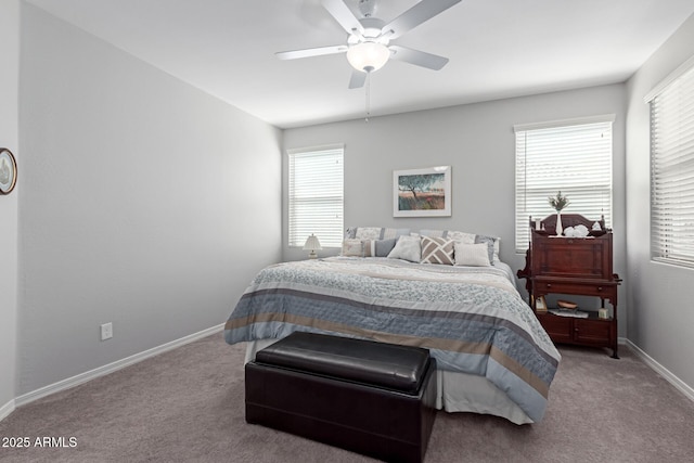 bedroom with carpet flooring, ceiling fan, and baseboards