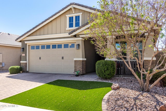 craftsman-style home with stone siding, stucco siding, driveway, and board and batten siding