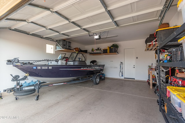 garage featuring a garage door opener