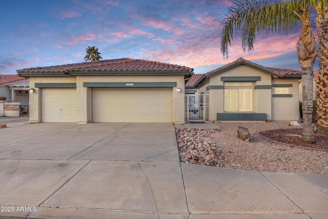 view of front of home with a garage