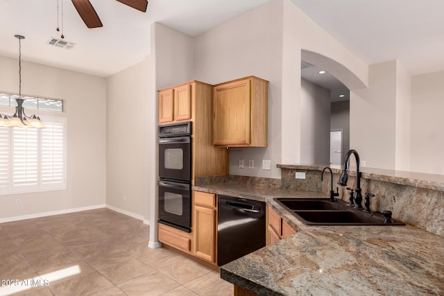 kitchen with sink, hanging light fixtures, dark stone countertops, kitchen peninsula, and black appliances